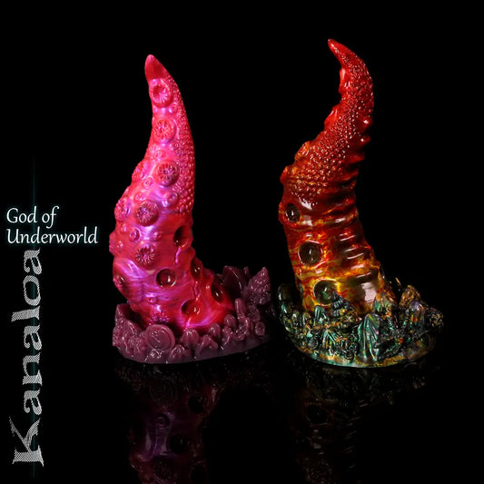 Kanaloa fantasy tentacle silicone dildo by Love Smiths in two colour blends, displayed upright on black reflective background with coral-like sculpted base.