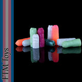 Fantasy gender-affirming silicone mini strokers in assorted colours and textured designs for FTM and AFAB anatomy