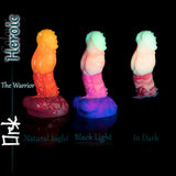 Fantasy ork silicone dildo shown in natural light, under black light, and glow-in-the-dark conditions demonstrating UV reactive and luminous effects.