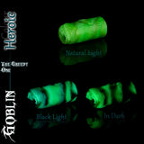 Heroic Goblin silicone masturbator in fluorescent and phosphorescent green, shown in natural light, under black light and glowing in darkness