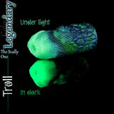 Legendary Troll silicone masturbator in green and blue, shown under normal light and glowing brightly in the dark
