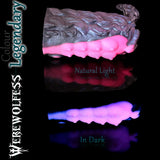 Werewolfess silicone stroker in Legendary dark purple, black and cosmic pink, shown in natural light and darkness
